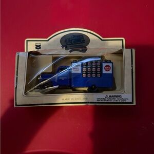 NIB Lledo says gone by chevron roof coating flat bed ornament.